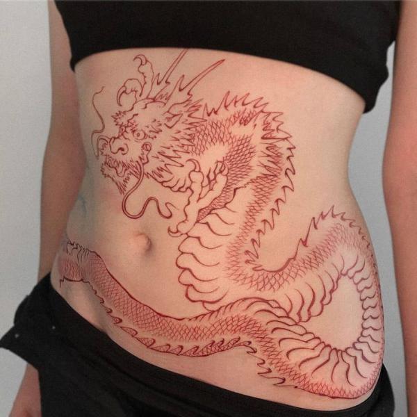 Red dragon stomach tattoo