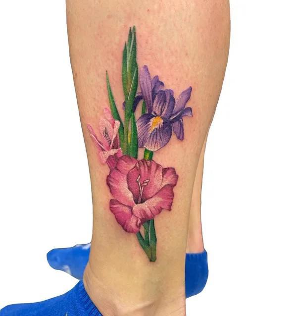 Red gladiolus and purple iris tattoo