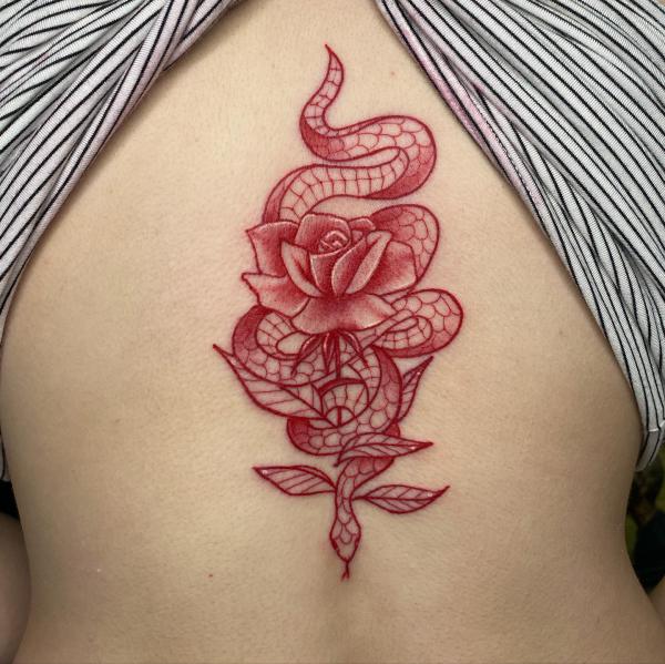 Red snake and rose tattoo