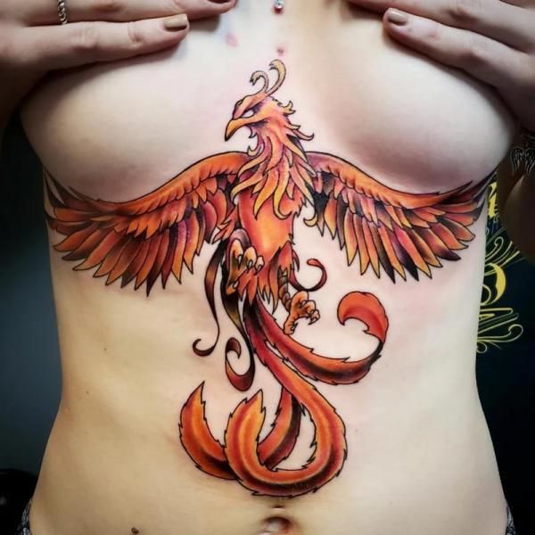 Rising phoenix stomach tattoo