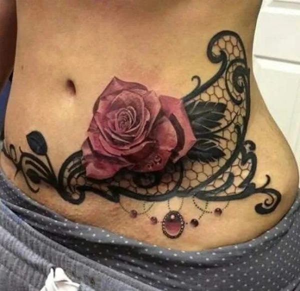 Rose and lace tummy tattoo