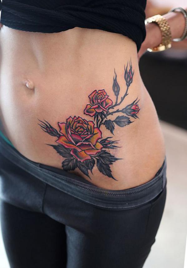 Rose side tummy tattoo