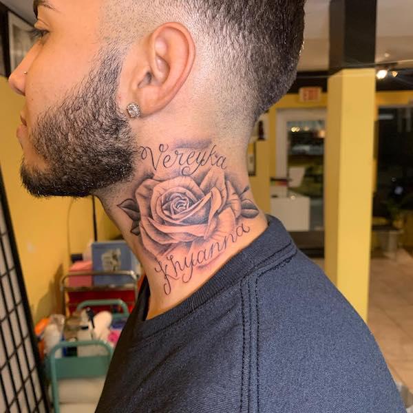 Rose with names neck tattoo