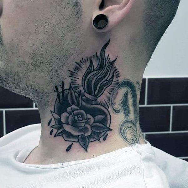 Sacred heart with rose black and white traditional tattoo on the side of neck