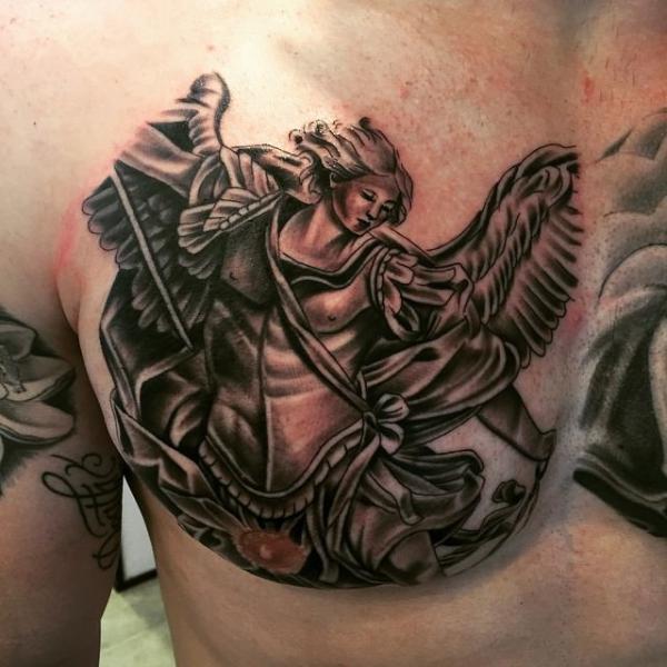 Saint Michael chest tattoo