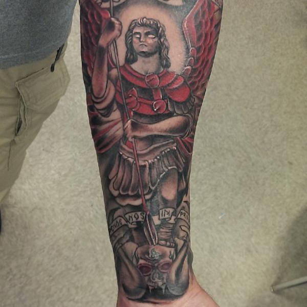 Saint Michael defeating satan tattoo