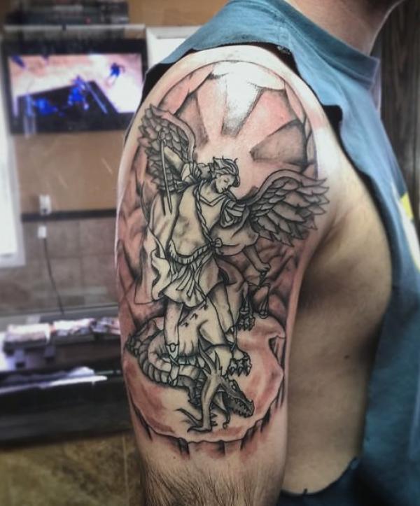 Saint michael defeating dragon tattoo