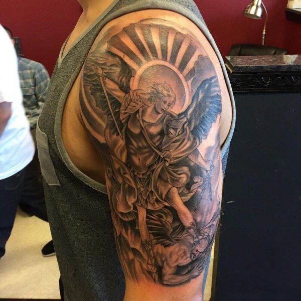 Saint michael fighting the devil tattoo