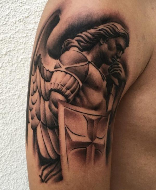 Saint michael holding shield and sword tattoo