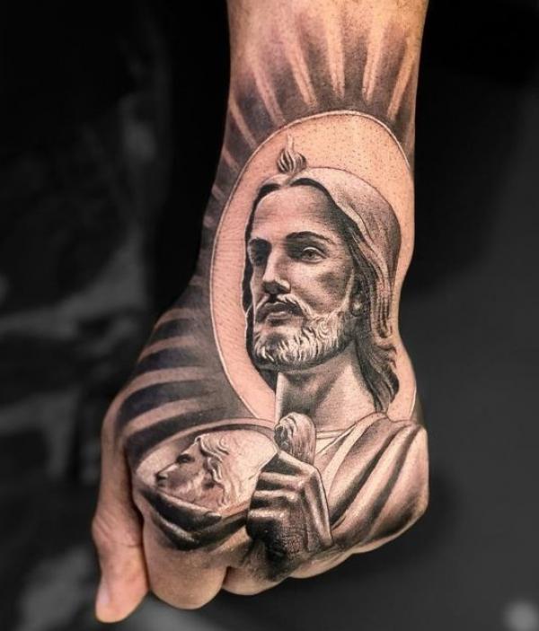 San Judas tattoo hand