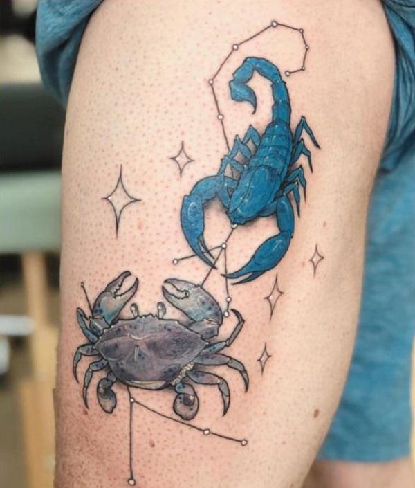 Scorpio and Cancer thigh tattoo