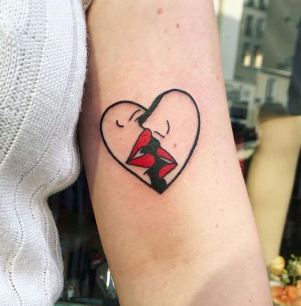 Simple broken heart face tattoo