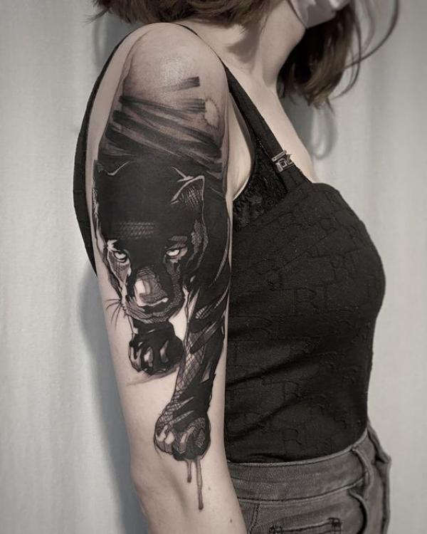 Sketchy black panther half sleeve tattoo