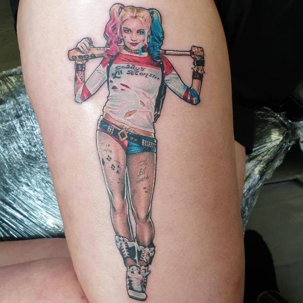 Small Harley quinn wearing Daddys Lil monster shirt tattoo