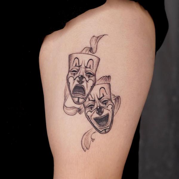 Small Laugh Now Cry Later thigh tattoo