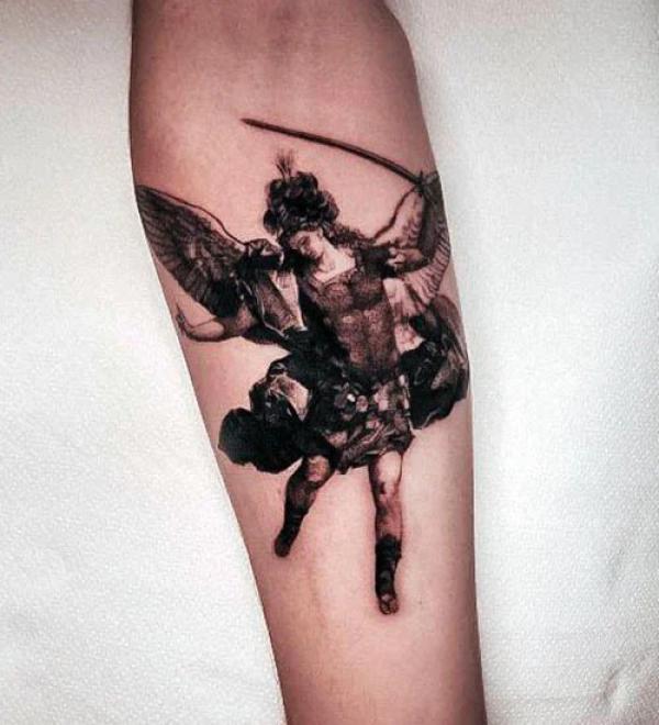 Small St Michael Tattoo on forearm