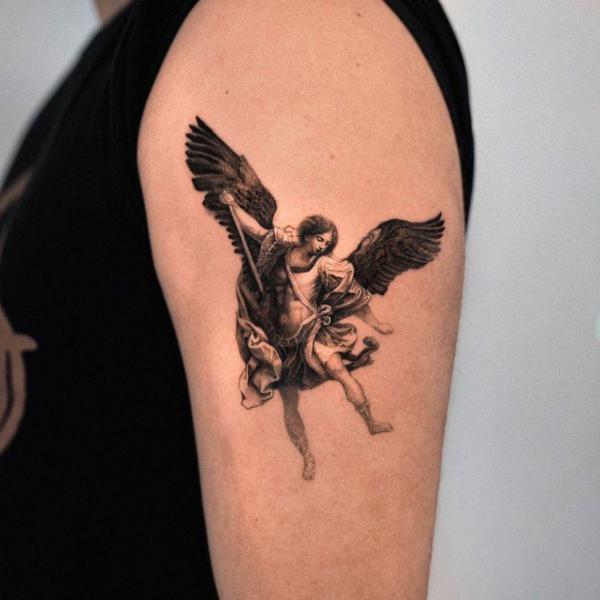 Small angel michael tattoo
