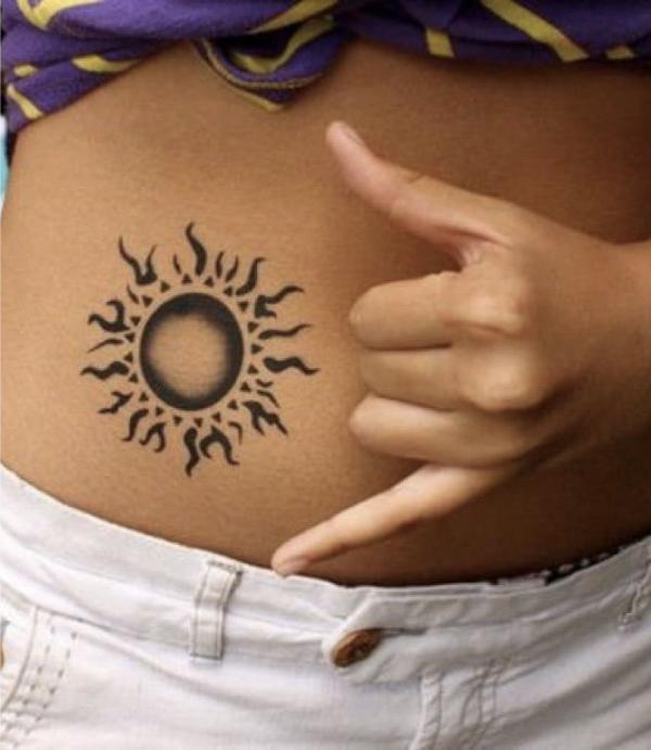 Small sun on the side of belly