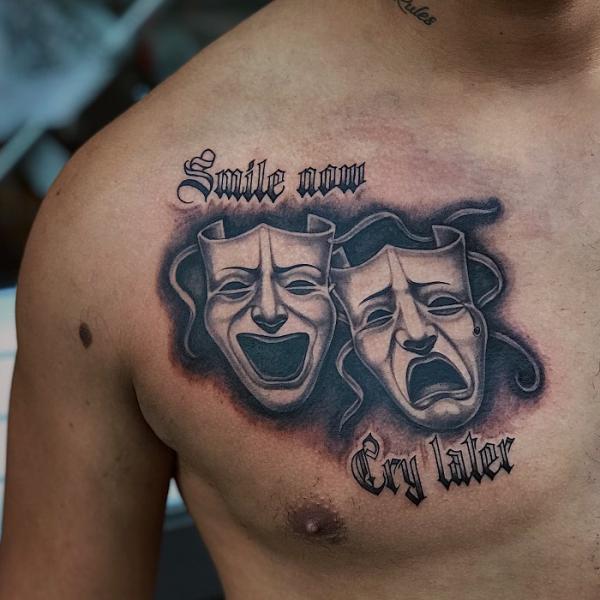 Smile Now Cry Later chest tattoo