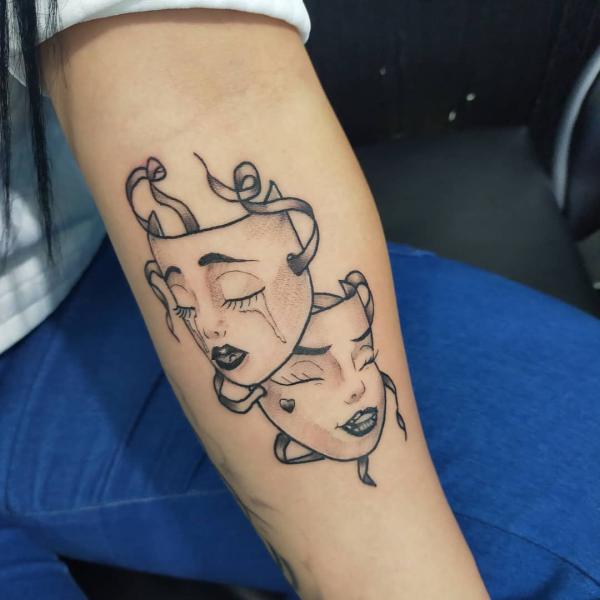 Smile Now Cry Later upper arm Tattoo