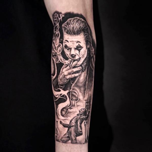 Smoking Joker forearm tattoo