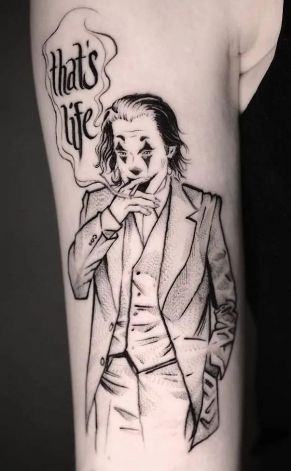 Smoking Joker sketch tattoo with phrase thats life