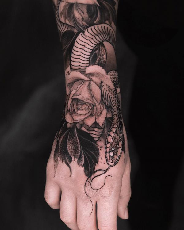 Snake and rose foot tattoo black and white