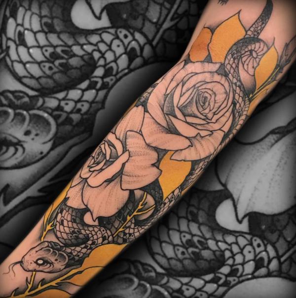 Snake and rose with yellow petals tattoo