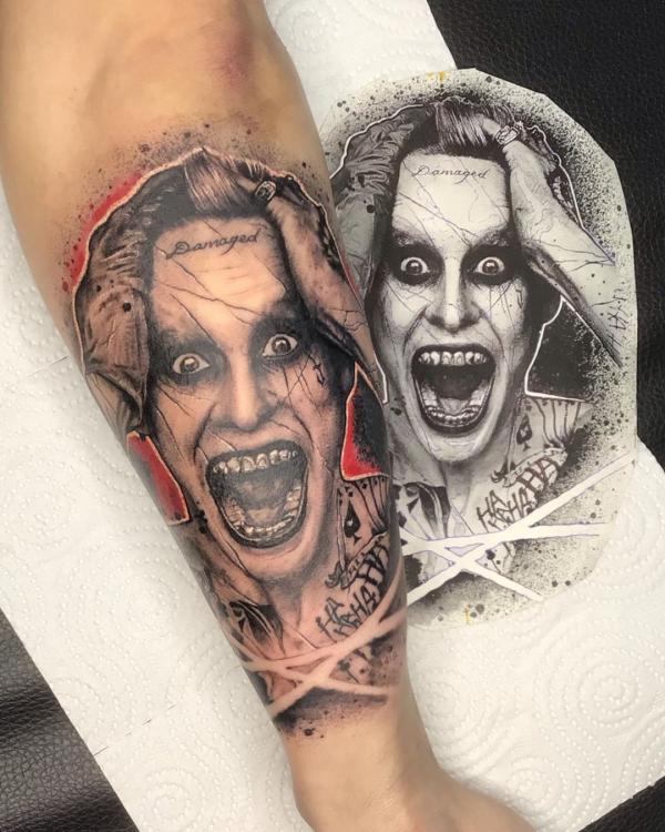 Suicide squad joker forearm tattoo
