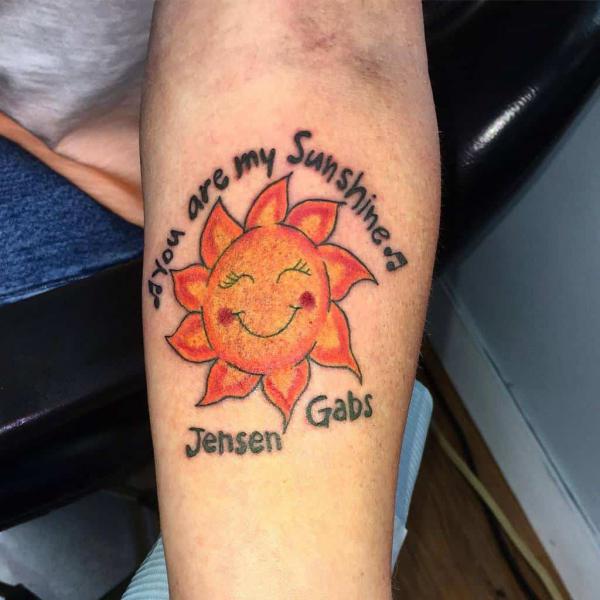 Sun face you are my sunshine tattoo with names