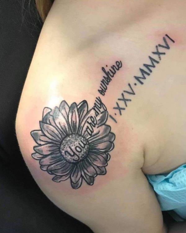 Sunflower You are my sunshine shoulder tattoo with Roman numerals