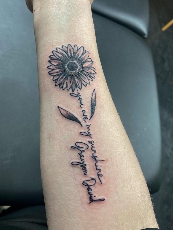 Sunflower you are my sunshine with name tattoo on inner forearm