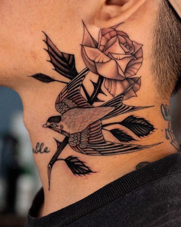 Swallow and rose neck tattoo