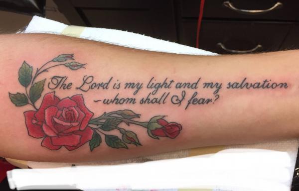 The LORD is my light and my salvation whom shall I fear psalm 27 with rose tattoo forearm