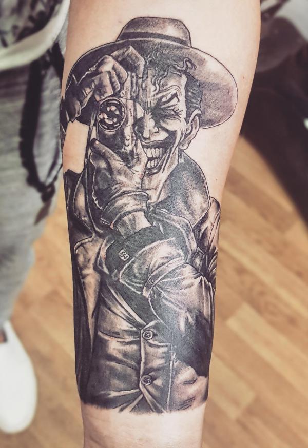 The killing joke joker forearm tattoo forearm