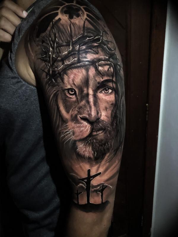Three cross and lion with thorn crown tattoo half sleeve