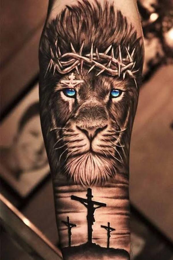 Three cross and lion with thorn crown tattoo