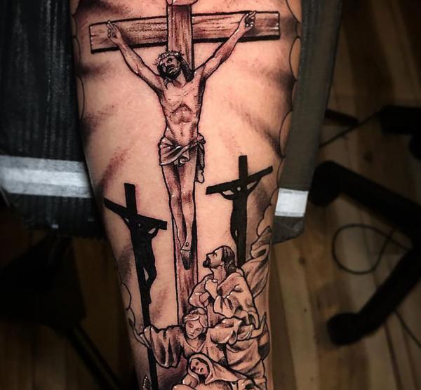 Three cross with Jesus arm tattoo