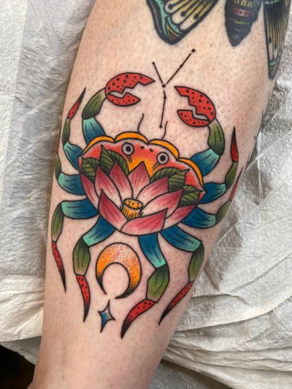 Traditional Lotus Zodiac cancer crab with constellation tattoo