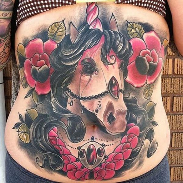 Traditional Unicorn with roses stomach tattoo