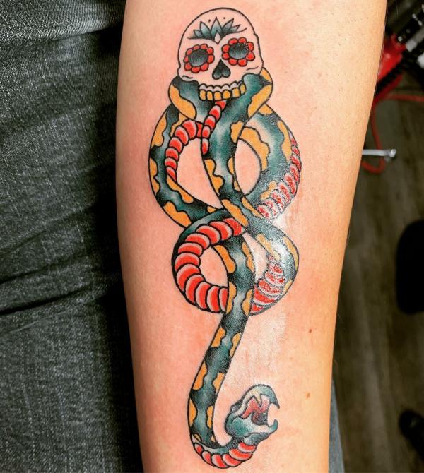 Traditional death eater arm tattoo