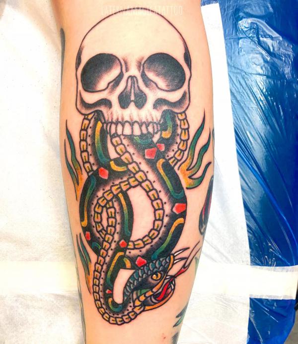 Traditional death eater forearm tattoo