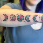 Traditional floral Moon phases tattoo