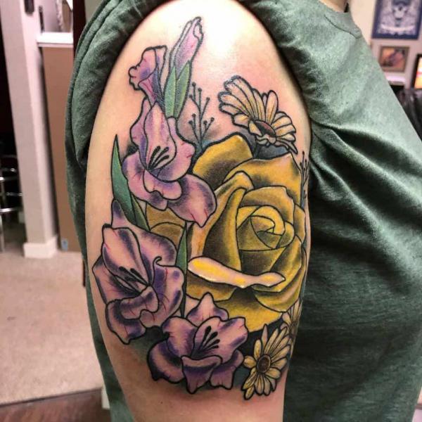 Traditional gladiolus and yellow rose tattoo