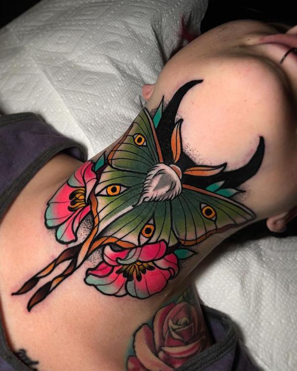 Traditional luna moth neck tattoo