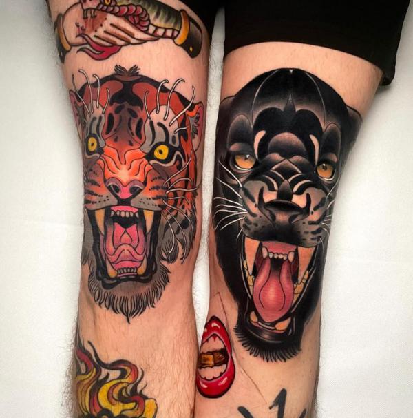 Traditional panther and tiger knee tattoo