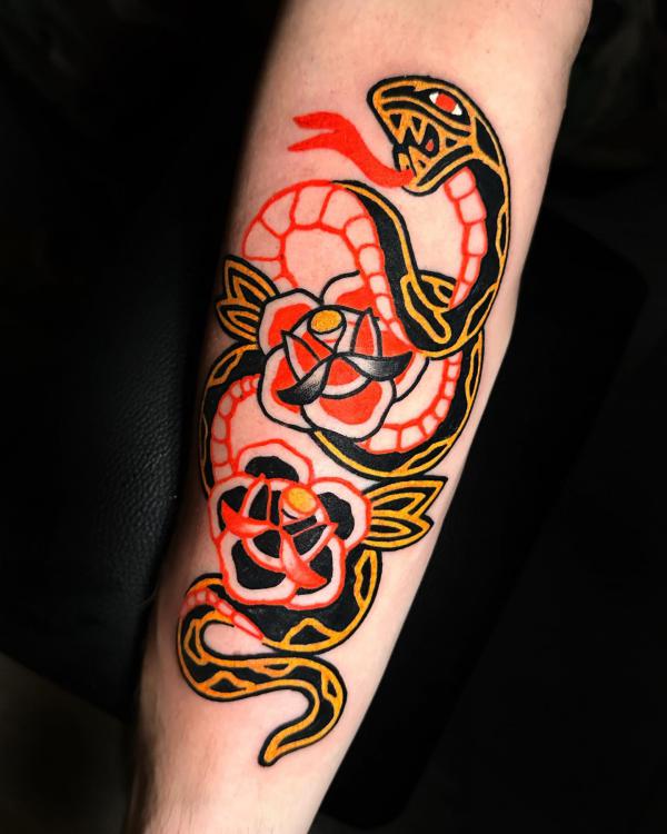 Traditional snake and rose bold line tattoo