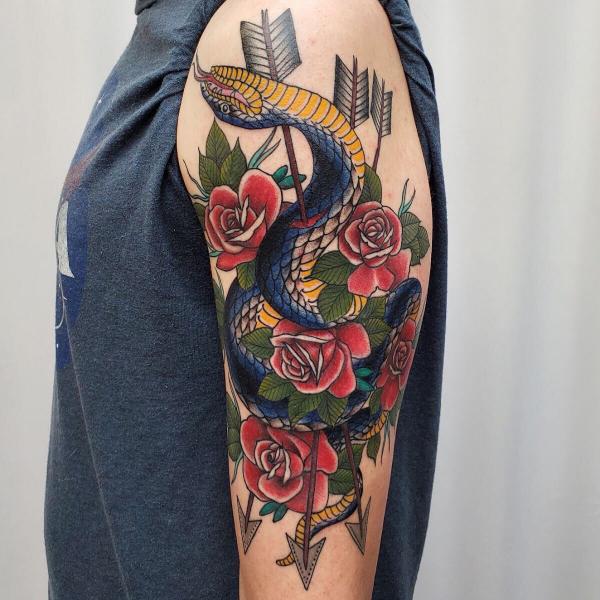 Traditional snake and rose with arrows tattoo