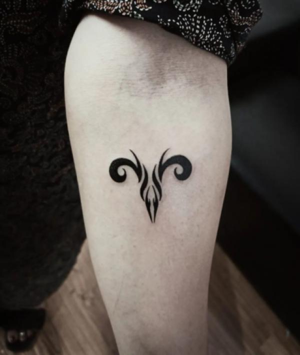 Tribal Aries glyph tattoo