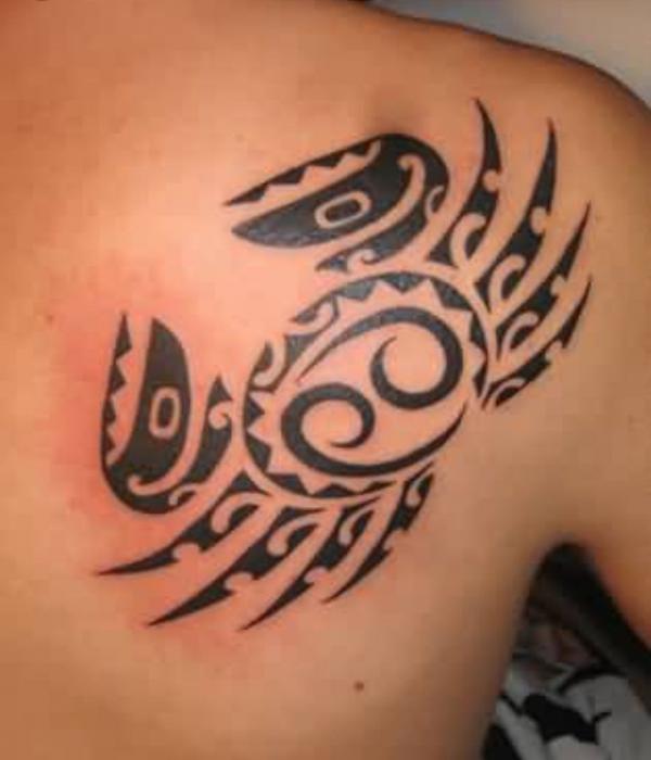 Tribal Zodiac cancer with glyph shoulder blade tattoo